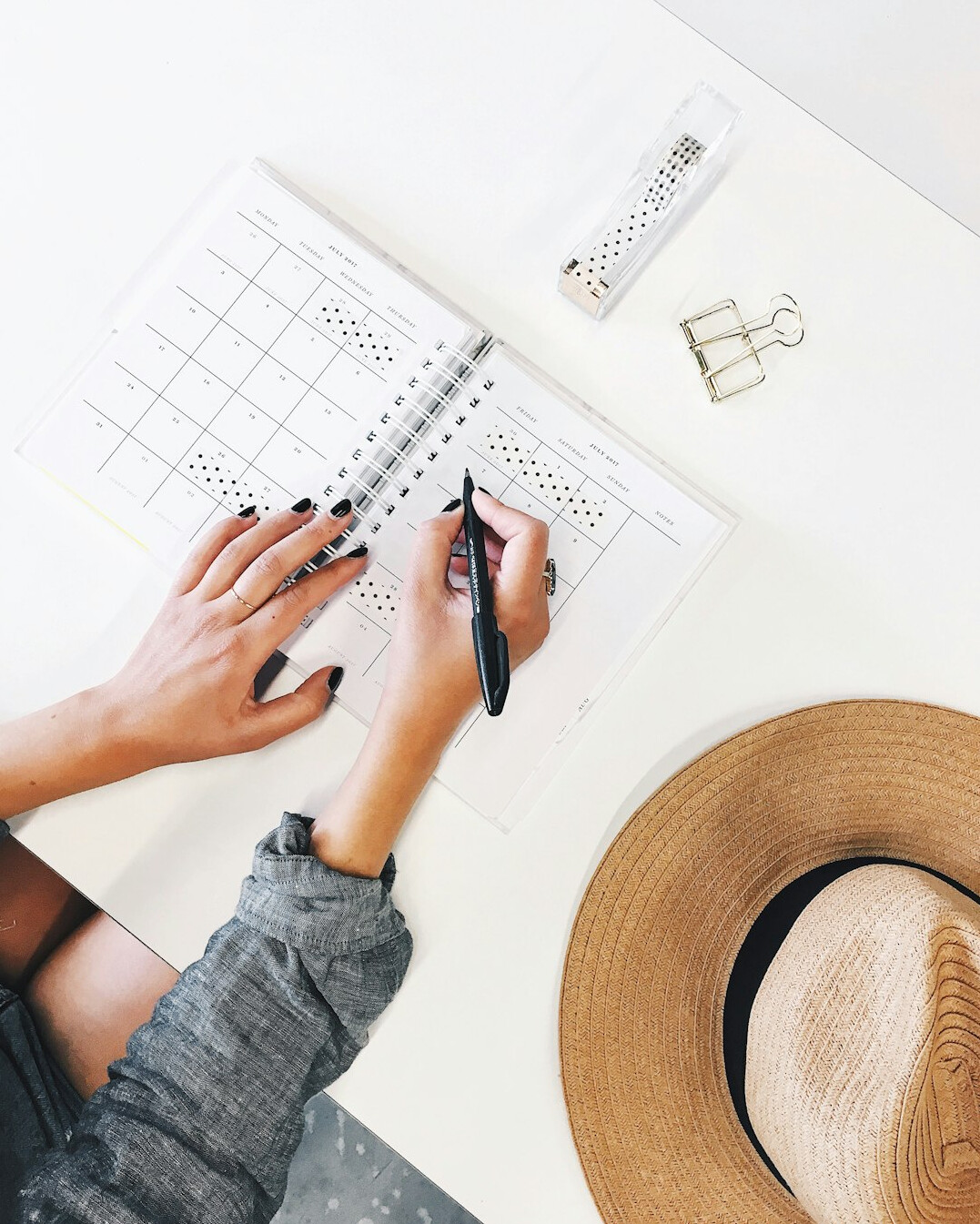 person checking progress on calendar