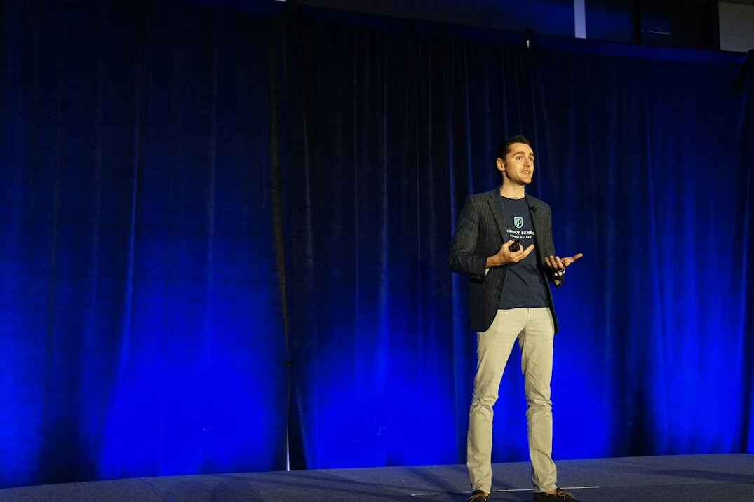 confident speaker on stage