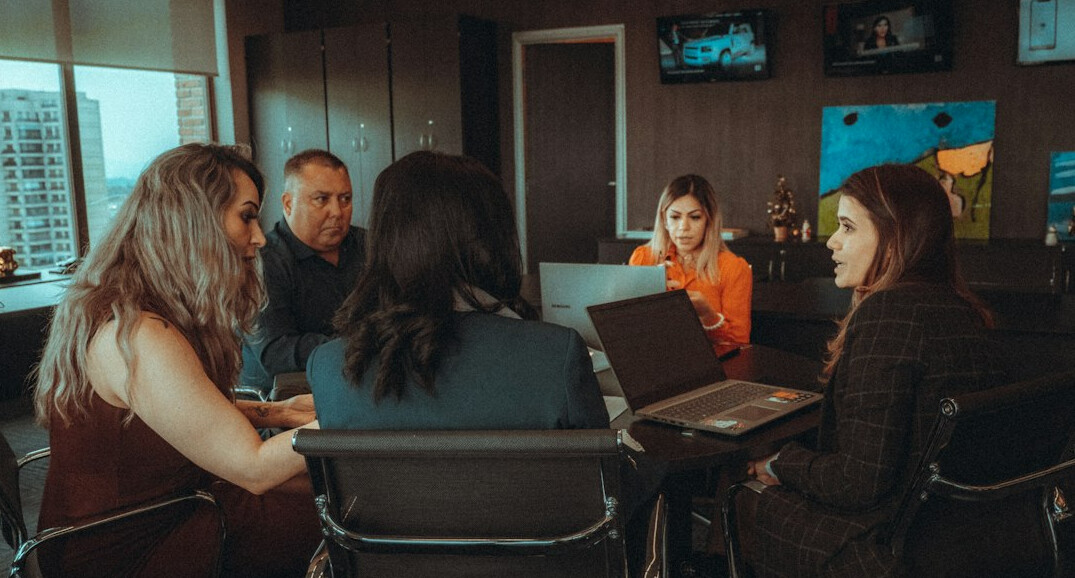 person speaking in meeting