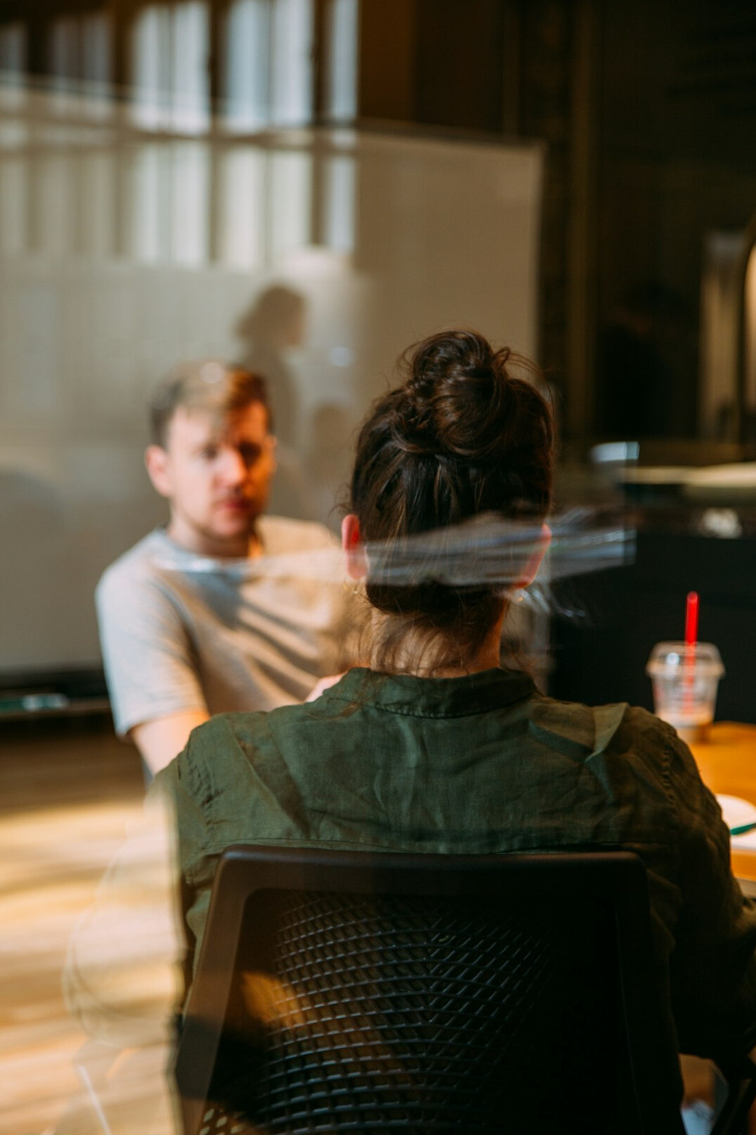 person listening to colleague